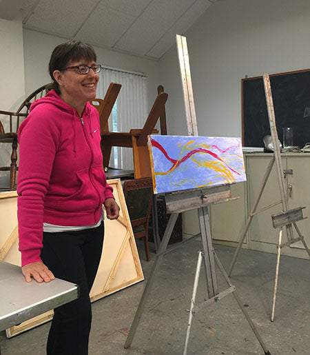 Me at the dreaded critique easel, you can tell from my expression the critique went well. Blue Low Tide © 2015 Alicia R Peterson. Acrylic on Linen, 10 x 30